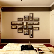 暖色经典三居欣赏卧室照片墙